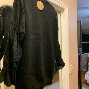 NWT BIBI Black sweater with eyelet sleeve. Size L
